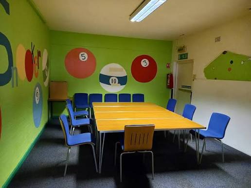 Indoor youth zone with pool table and games layout